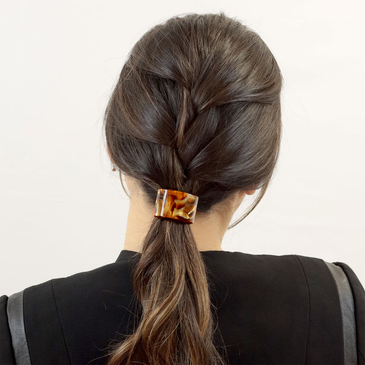 Zopf mit halbrundem Haargummi Granada