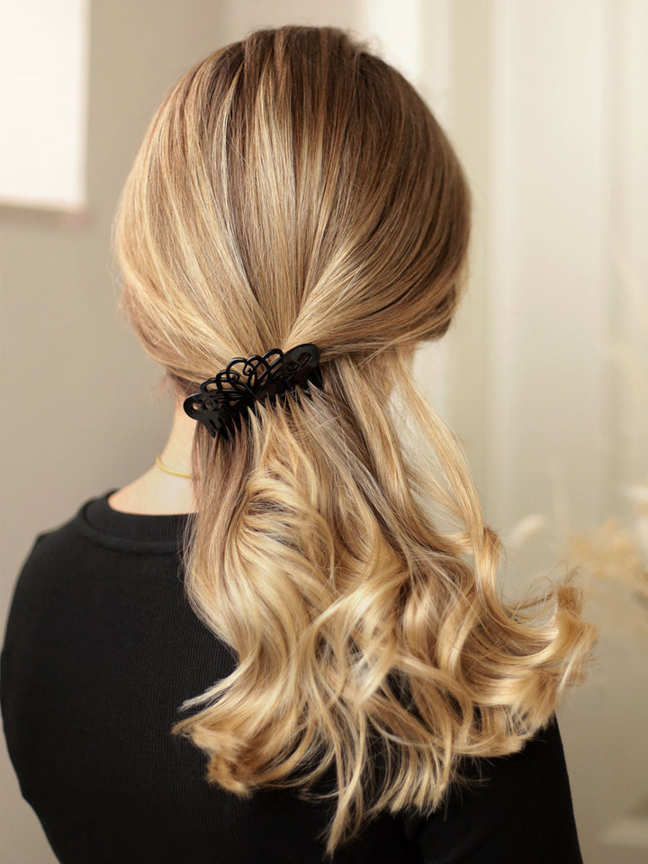 Zopf mit mittelgroßem, schwarzem Haarkamm London mit Arabeske