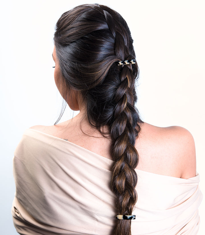 Zopf mit kleinen Haarspangen Lausanne