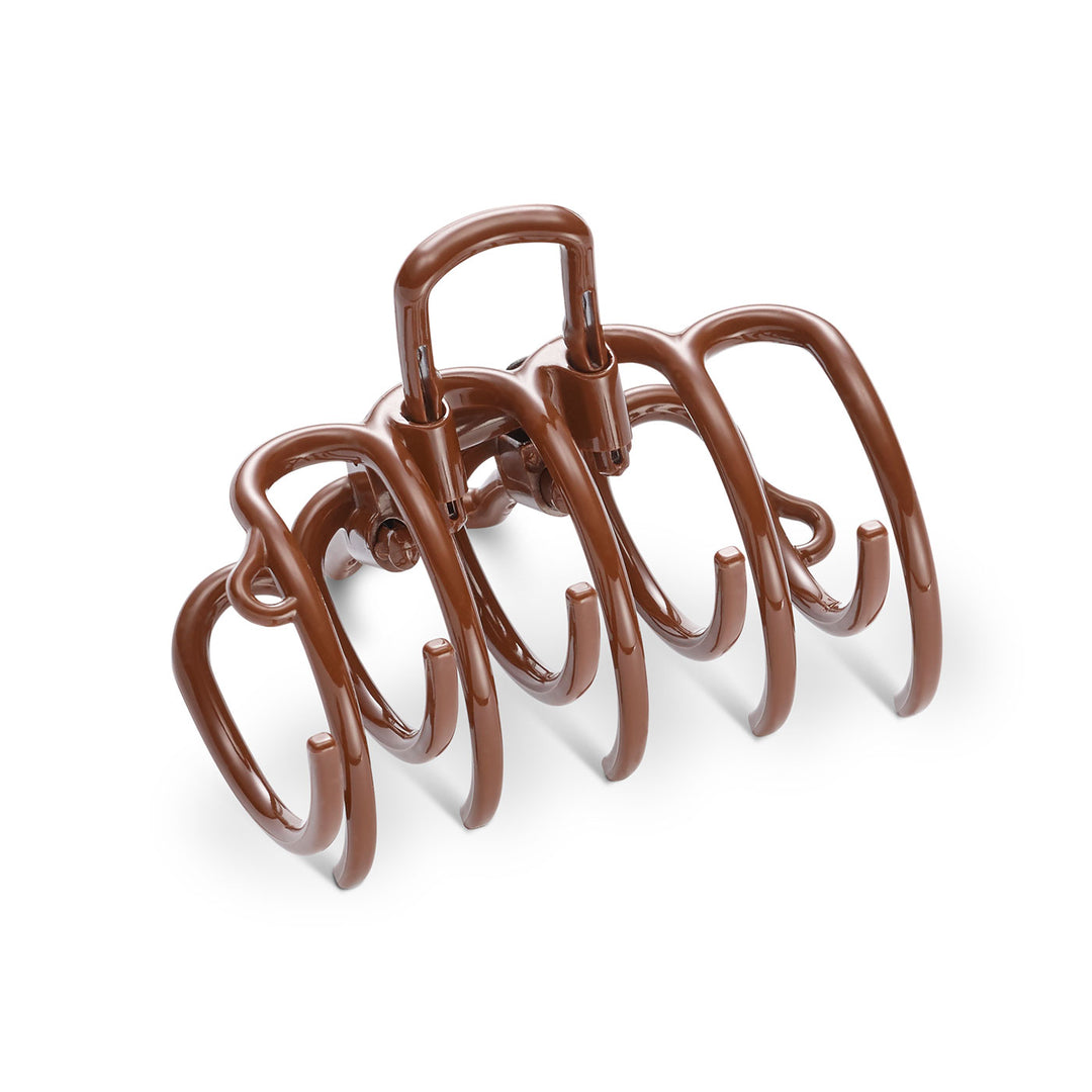 Seitliche Ansicht der Haarklammer  in Braun – mit patentierten Bügeln für versteckbaren Halt im Haar