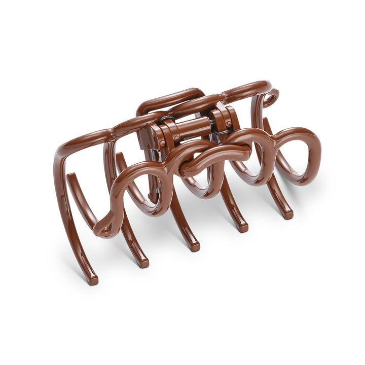 Detailansicht der elastischen Zähne und braunen Oberfläche der großen Haarklammer  in Chocolate Brown