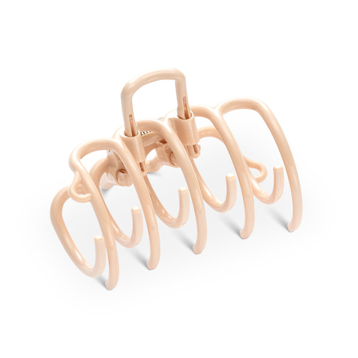 Haarklammer groß in Nude – mit sanfter Farbgebung auf weißem Hintergrund