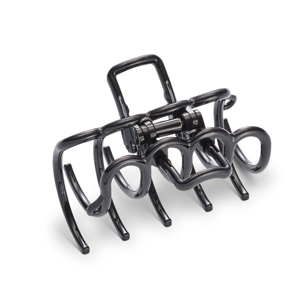 Schwarze Haarklammer – große, elegante Klammer für dunkles Haar auf weißem Hintergrund