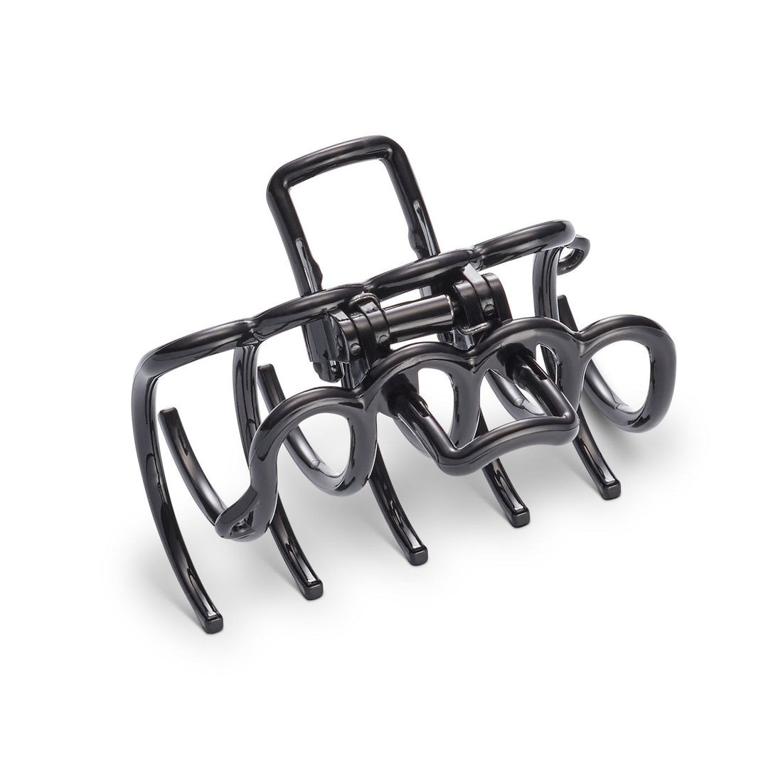 Schwarze Haarklammer – große, elegante Klammer für dunkles Haar auf weißem Hintergrund