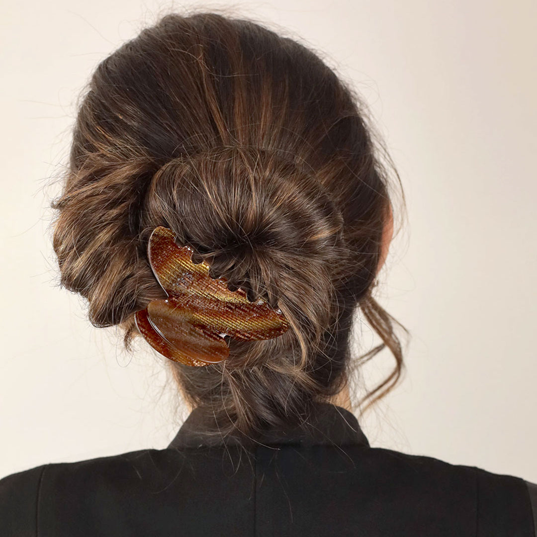 Hochsteckfrisur mit großer Haarklammer Moskau