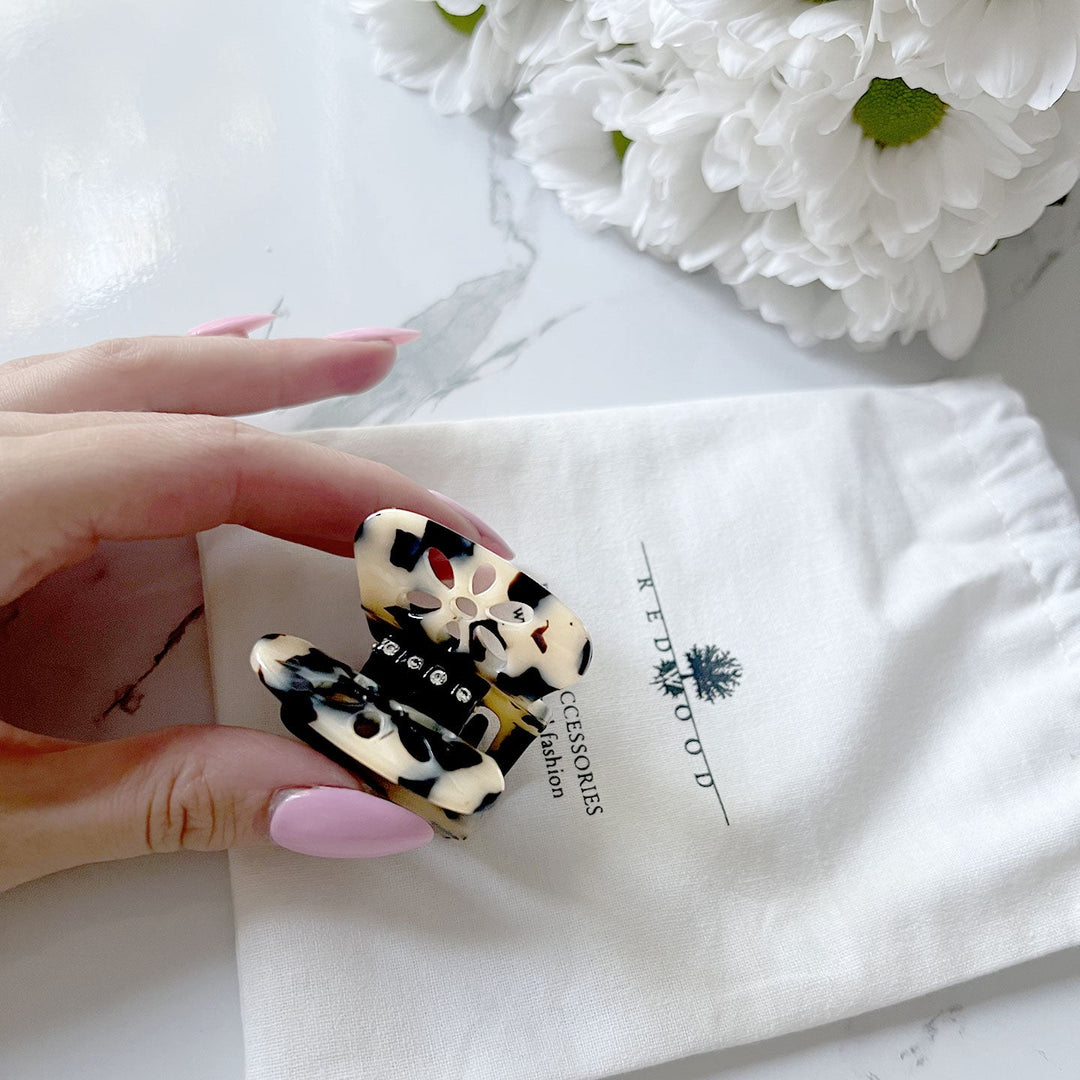 Pince à cheveux Lausanne de taille moyenne, élastique breveté, design floral avec strass